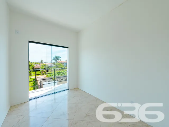 Sobrado com 1 suíte + 2 quartos no bairro Costeira