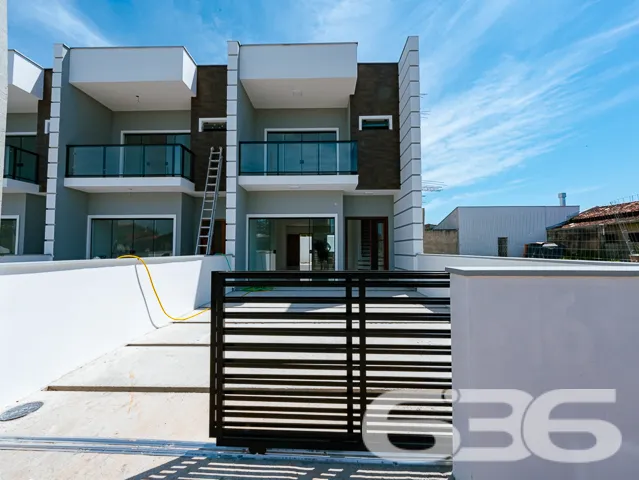 Sobrado com 1 suíte + 2 quartos no bairro Costeira